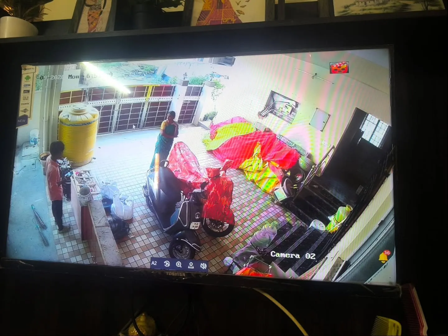 Hikvision 2MP wide angle CCTV live view monitoring front gate entrance and covered two wheeler parking area